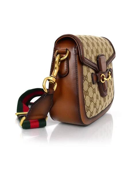 gucci sling|gucci crossbody with striped strap.